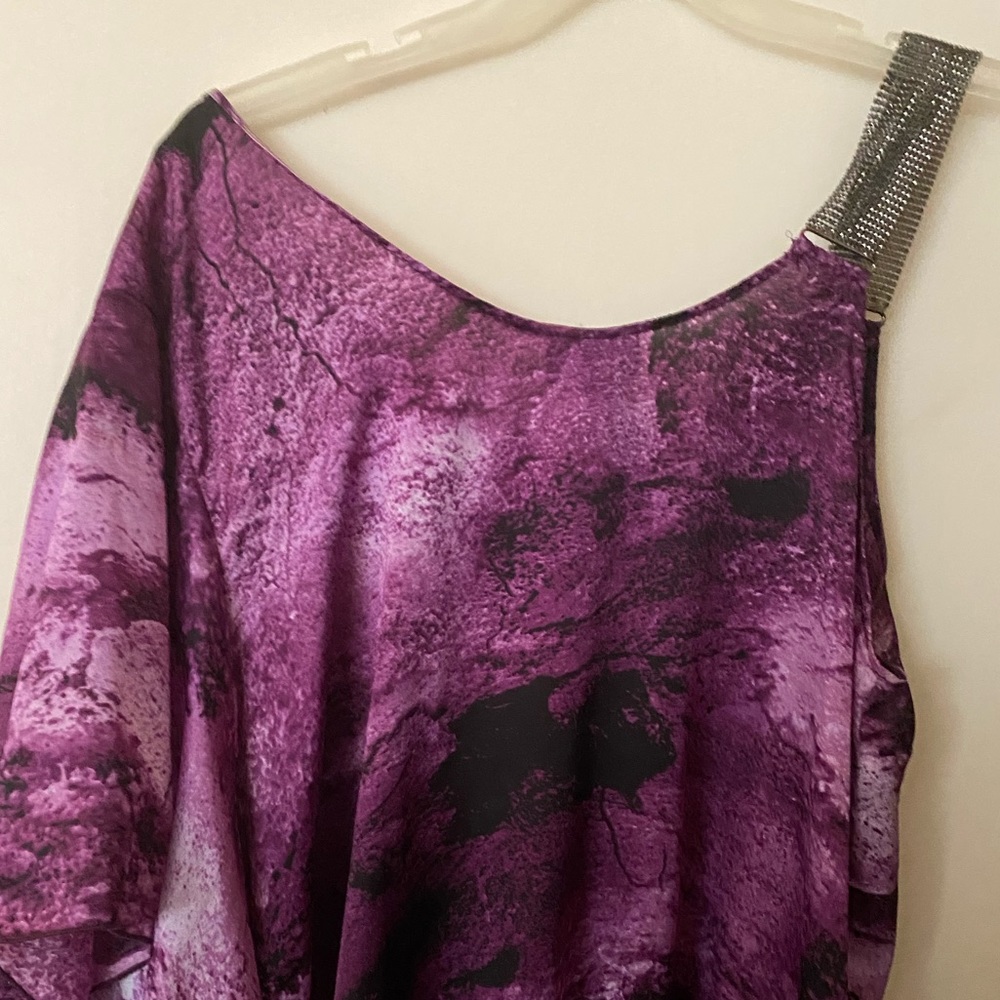 Elegant for a night on the town. Good Condition